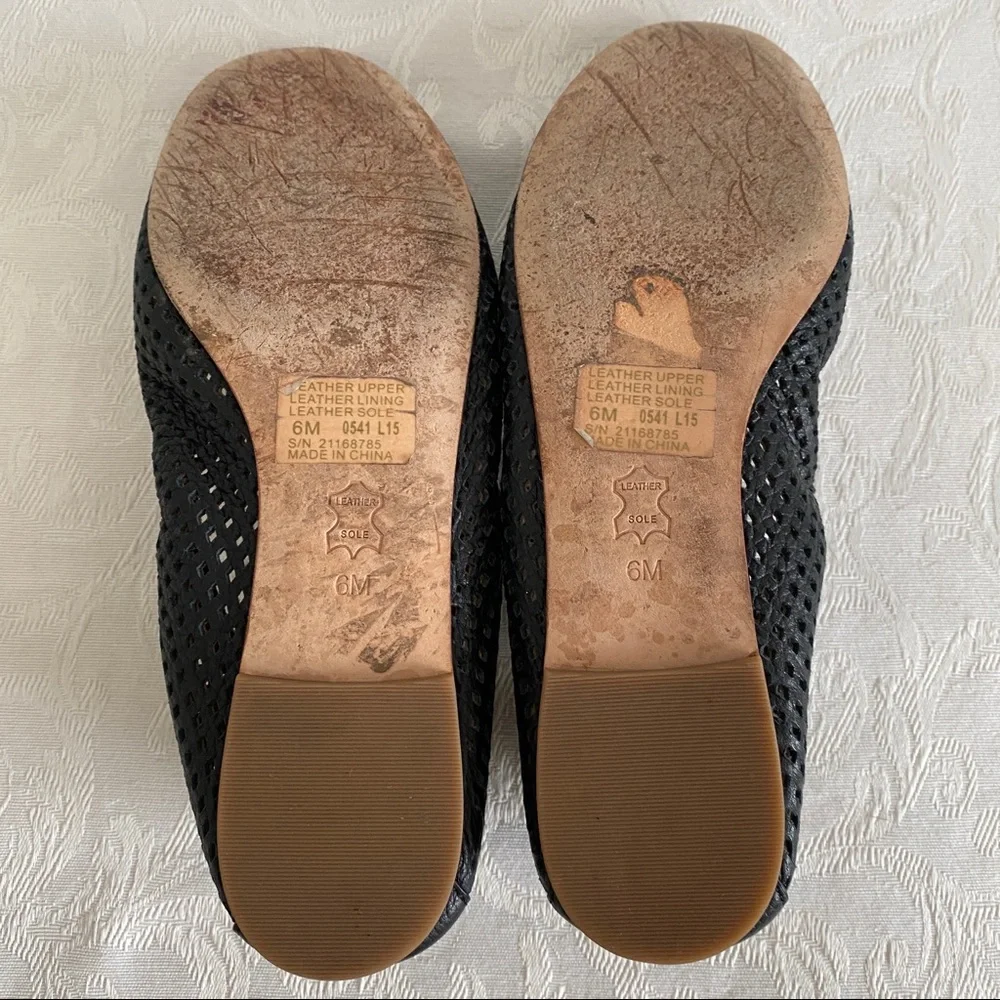 Tory Burch black perforated flats